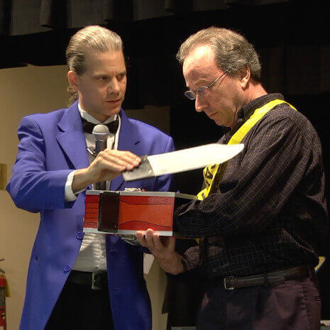 The arm box illusion is performed during Chicago birthday magic show!