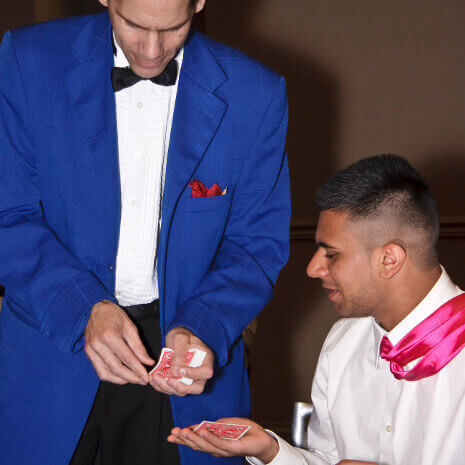 A Chicago man helps a local magician perform a card trick!